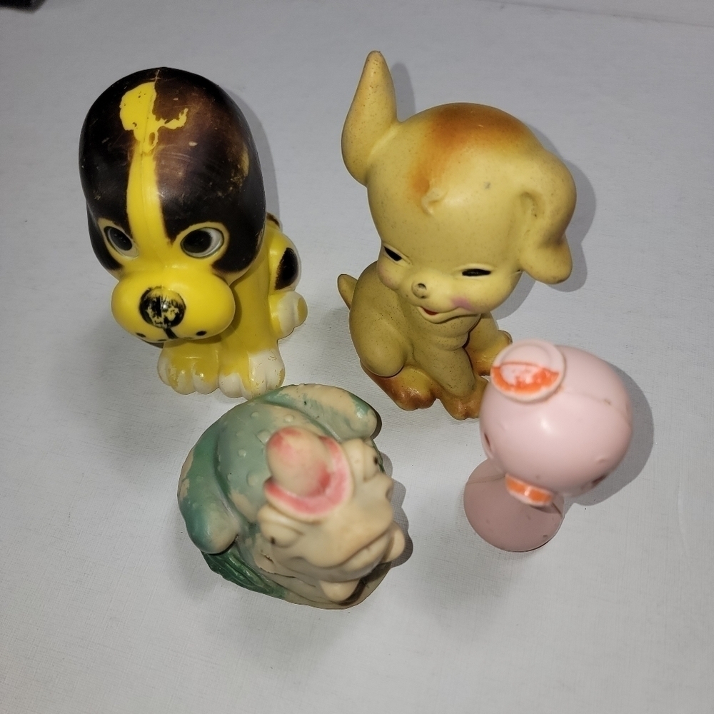 Four vintage toys.
